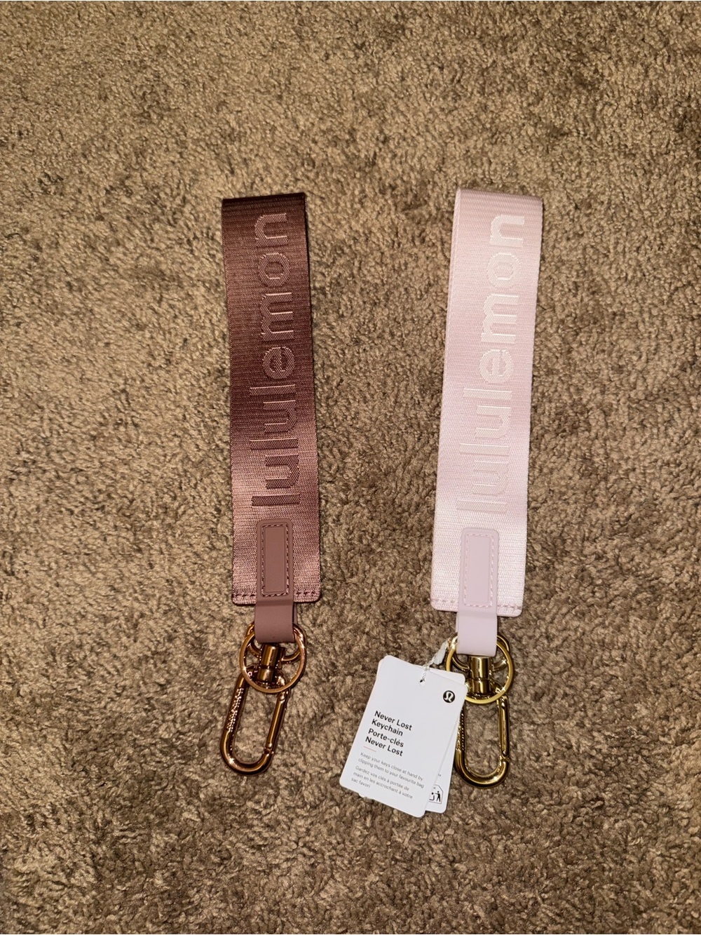 2 Lululemon Never Lost key chains (1 NWT) (1 NWOT) sold out color ways